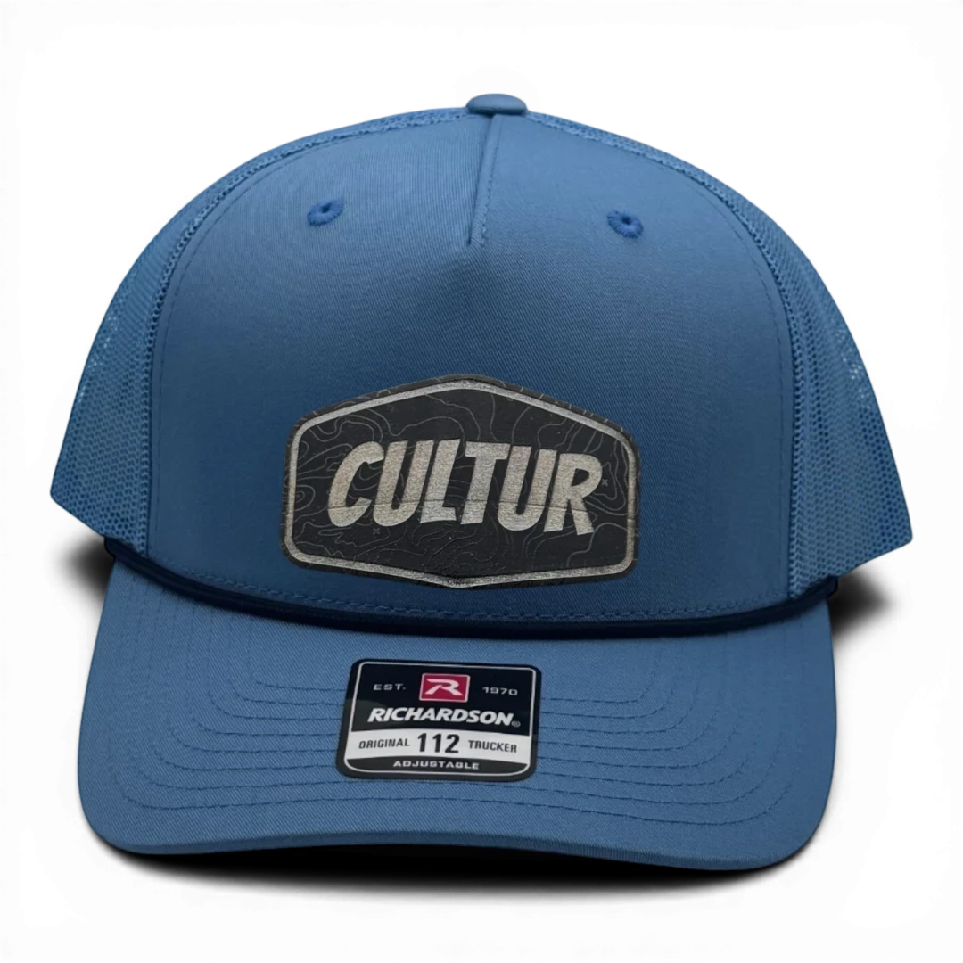 CULTUR blue trucker hat with topographic patch and adjustable strap