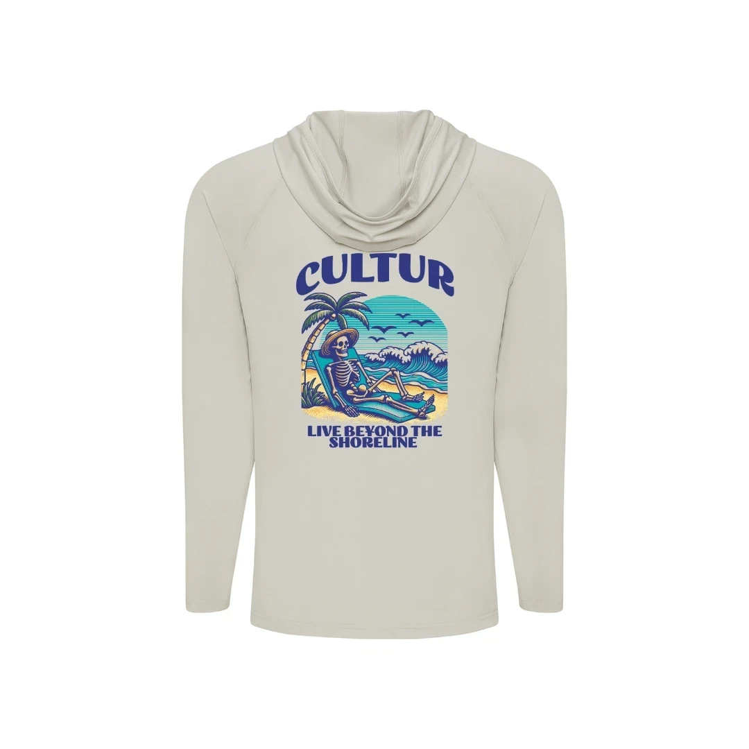 Cultur long sleeve hooded performance shirt in light beige with a skeleton graphic on a beach chair, palm tree, and ocean waves.
