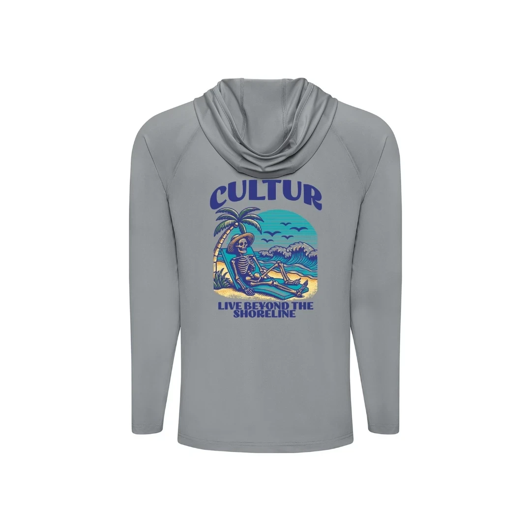 Cultur grey long sleeve hooded performance shirt with skeleton on beach graphic and "Live Beyond The Shoreline" text.
