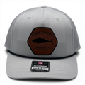 CULTUR white trucker hat with a hexagonal brown patch featuring a black tuna silhouette and